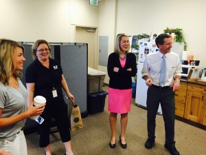 Channel 2's Sales Manager Valerie shares a moment with news anchors Kelsey Anderson and Brian Morrin during a visit to Capital Group.